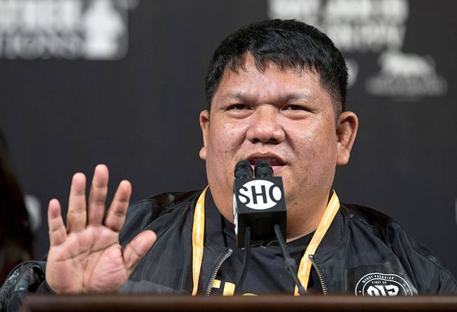 Trainer Buboy Fernandez speaks on Manny Pacquiao's condition during a news conference at the MGM Grand Wednesday, Jan. 16, 2019. WBA welterweight champion Manny Pacquiao of the Philippines will defend his WBA title against Adrien Broner of Cincinnati, Ohio at the MGM Grand Garden Arena Saturday.