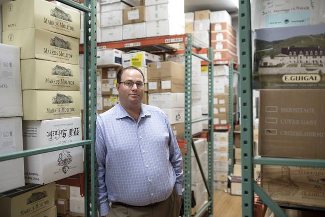  Daniel Posner, the president of the National Association of Wine Retailers, stands in front of inventory at Grapes the Wine Company, where he is the managing partner, in White Plains, N.Y., Oct. 11, 2017. In Tennessee Wine and Spirits Retailers Association v. Blair, the Supreme Court will consider whether states can prohibit retail wine shops from shipping to consumers in another state.