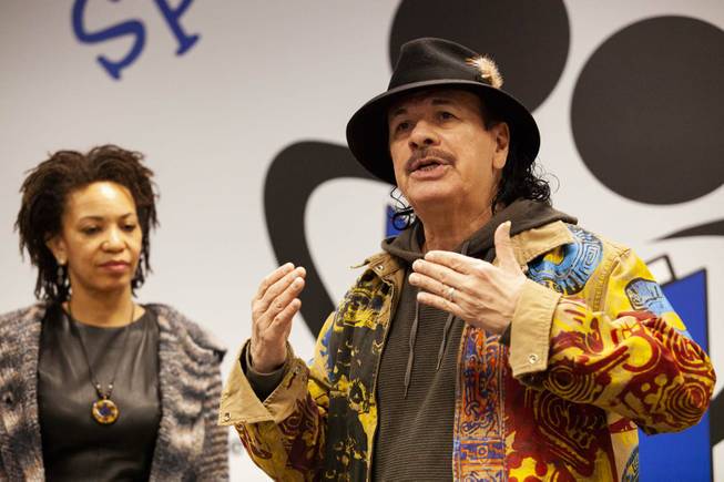 Carlos Santana speaks during a tour at the Spread the Word Nevada offices and warehouse in Henderson, NV, Thursday, Jan. 17, 2019. Santana's Milagro Foundation made a donation to Spread the Word, which will provide about 15,000 books to 57 schools across Southern Nevada.