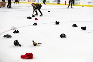Hats dot the ice after a Jonathan Marchessault hat trick in a Golden Knights win over Pittsburgh at T-Mobile Arena Saturday, Jan. 19, 2019.