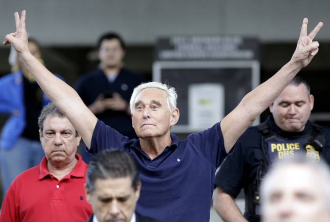 Former campaign adviser for President Donald Trump, Roger Stone walks out of the federal courthouse following a hearing, Friday, Jan. 25, 2019, in Fort Lauderdale, Fla. Stone was arrested Friday in the special counsel's Russia investigation and was charged with lying to Congress and obstructing the probe.