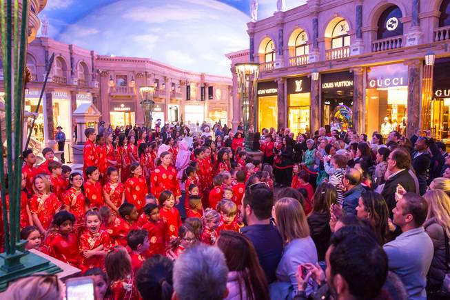 Students from The Meadows School perform a traditional dragon parade through the Forum Shops at Caesars Palace in celebration of Chinese New Year and the Year of the Pig, Tuesday Feb. 5, 2019.