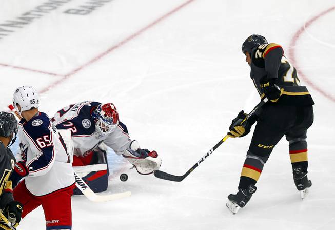 Columbus Blue Jackets goaltender Sergei Bobrovsky (72) stops a shot by Vegas Golden Knights right wing Ryan Reaves (75) during the first period at T-Mobile Arena Saturday, Feb. 9, 2018.