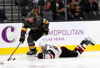 Vegas Golden Knights center Paul Stastny (26) skates past Arizona Coyotes defenseman Jordan Oesterle (82) during the third period at T-Mobile Arena Tuesday, Feb. 12, 2018.