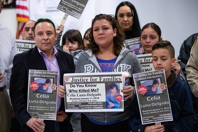 Sheyla Padilla stands alongside family members during a Justice for Families press conference for the unsolved murder of her mother Celia Luna-Delgado Thursday, Feb. 14, 2019. Luna-Delgado was killed during a robbery by two suspects who have still not been apprehended. Anyone with tips can call (702) 828-3521, email homicide@lvmpd.com or text CRIMENV along with tip to 274637 (CRIMES).