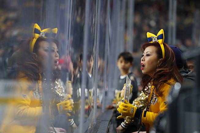 A Nashville fan cheers for the Predators during the third period of their game against the Vegas Golden Knights at T-Mobile Arena Saturday, Jan. 16, 2019.