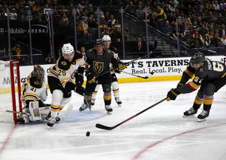 Vegas Golden Knights left wing Max Pacioretty (67) stretches to reach the puck in the second period during a game against the Boston Bruins at T-Mobile Arena Wednesday, Feb. 20, 2019.
