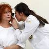 Actor-patient Beverly Washburn is examined by medical student Michelle Baek at Touro University Nevada in Henderson Friday, Feb. 1, 2019.