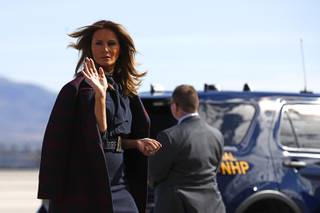 First lady Melania Trump waves as she boards an aircraft at McCarran International Airport in Paradise, Nev., after participating in a town hall on the opioid epidemic in Las Vegas, Tuesday, March 5, 2019, during a two-day, three-state swing to promote her Be Best campaign.