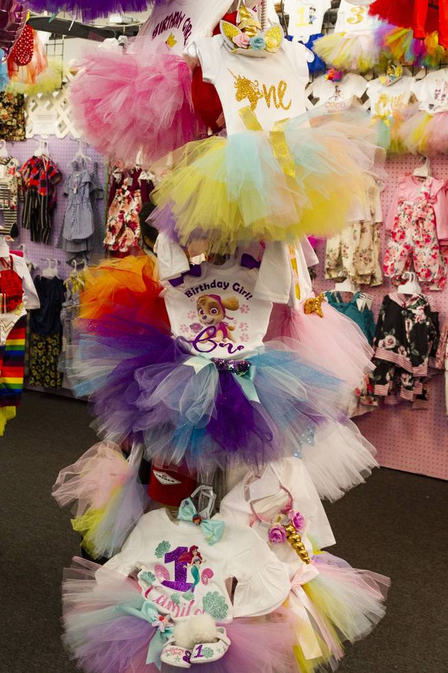 Tutu outfits are on display at a children's clothing booth at Fantastic Indoor Swap Meet Sunday, Feb. 17, 2019.