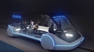 High-Occupancy Autonomous Electric Vehicle (AEV) running between Exhibit Halls. Courtesy The Boring Company.