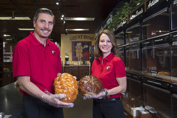 Cousins Tony Madonia and Deborah Morelli pose in the retail area at Great Buns Bakery, 3270 E. Tropicana Ave., Thursday, March 14, 2019. The family-owned bakery has been operating in Las Vegas since 1982. Tony is holding Six-Braided Challah. Deborah holds Artisan Rye Raisin bread.
