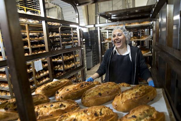Diana Trujillo moves Irish soda bread for packing at Great Buns Bakery, 3270 E. Tropicana Ave., Thursday, March 14, 2019. The family-owned bakery has been operating in Las Vegas since 1982.