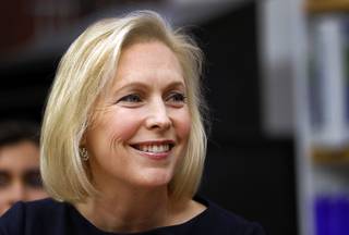 Democratic presidential candidate Sen. Kirsten Gillibrand, D-N.Y., listens to student attorneys at the UNLV Immigration Clinic during a discussion on immigration Thursday, March 21, 2019, in Las Vegas.