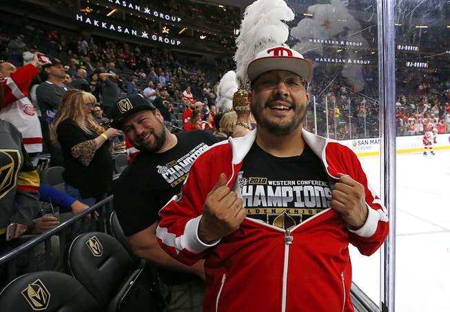 Richard Rodriguez shows that his heart belongs to the Vegas Golden Knights as he displays his VGK T-shirt under a Red Wings jacket before a game at T-Mobile Arena Saturday, March 23, 2019.