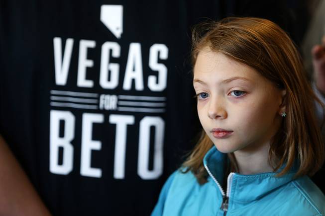 A girl waits for Democratic presidential candidate Beto O'Rourke of Texas at Arandas Taqueria on North Nellis Boulevard Sunday, March 24, 2019.