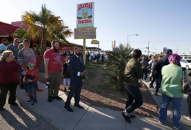 Supporters head into  Arandas Taqueria on North Nellis Boulevard as they wait for Democratic presidential candidate Beto O'Rourke of Texas Sunday, March 24, 2019.