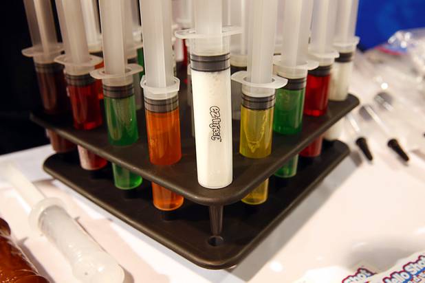 Ez-Inject syringes are displayed in the EZ-Jello Shot Products booth during the Nightclub & Bar Convention and Trade Show at the Las Vegas Convention Center Tuesday, March 26, 2019.