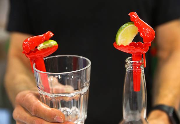 HeadLimes are displayed during the Nightclub & Bar Convention and Trade Show at the Las Vegas Convention Center Tuesday, March 26, 2019. The device helps you squeeze a lime wedge into your beer or cocktail.