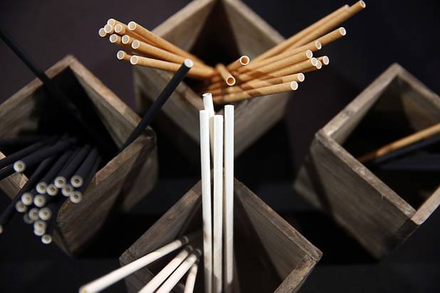 Paper straws are displayed at the Basic Straws booth during the Nightclub & Bar Convention and Trade Show at the Las Vegas Convention Center Tuesday, March 26, 2019. The straws will stay good in a drink for 6 hours, a representative said.
