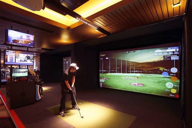 The Topgolf Swing Suite is a new addition at the M Resort in Henderson Thursday, March 28, 2019. The suite offers virtual golf, hockey and other games. The hotel-casino is celebrating it's 10th anniversary this month.
