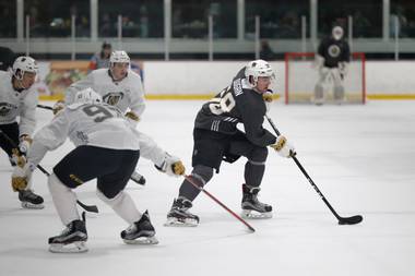 Golden Knights forward Jack Dugan (58) controls the puck during a scrimmage at the team’s development camp on July 1, 2017, at the Las Vegas Ice Center. 