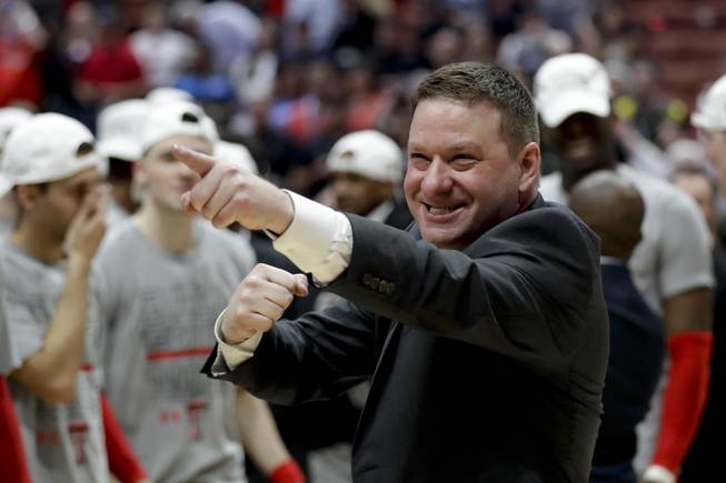 Texas Tech head coach Chris Beard celebrates after the team's win against Gonzaga during the West Regional final in the NCAA men's college basketball tournament Saturday, March 30, 2019, in Anaheim, Calif. Texas Tech won 75-69.