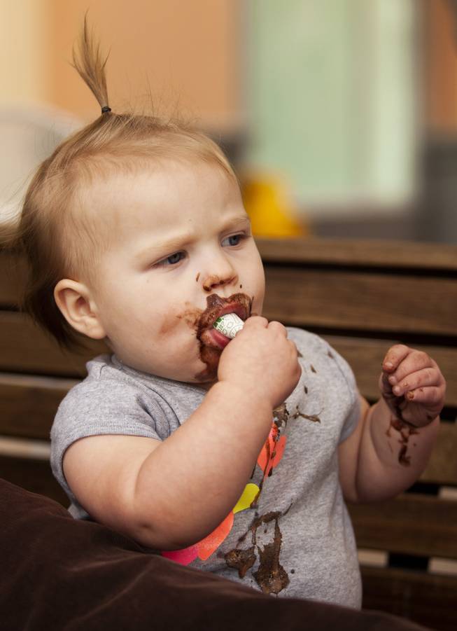 Koralei, 18 months, eats her free cone during Ben & Jerry's Free Cone day at The District at Green Valley Ranch Tuesday, April 9, 2019. All donations benefit the Court Appointed Special Advocate (CASA) Foundationa nonprofit group supporting children in foster care.