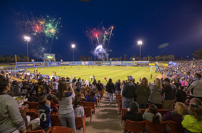 Fireworks explode at the start of a game between the ...