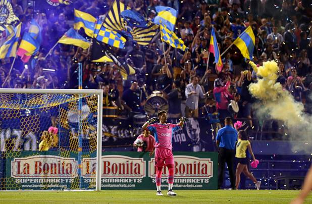 Las Vegas Lights FC fans celebrate a goal against the Tacoma Defiance at Cashman Field Saturday, April 13, 2019. Lights' goaltender Thomas Olsen of Las Vegas is at center. The Lights shut out the Defiance 5-0.