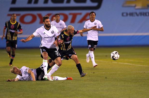 Las Vegas Lights' Pablo Cruz (7) chases after a ball during a game against the Tacoma Defiance at Cashman Field Saturday, April 13, 2019. The Lights shut out the Defiance 5-0.