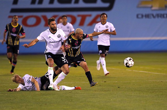 Las Vegas Lights' Pablo Cruz (7) chases after a ball ...