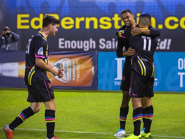 Las Vegas Lights' Irvin Parra (11) is congratulated by teammates after scoring against the Tacoma Defiance at Cashman Field Saturday, April 13, 2019. The Lights shut out the Defiance 5-0.