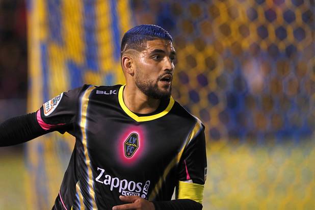 Las Vegas Lights' Irvin Parra (11) celebrates after scoring during a game against the Tacoma Defiance at Cashman Field Saturday, April 13, 2019. The Lights shut out the Defiance 5-0.