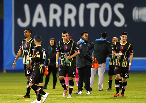 Las Vegas Lights players leave the field after beating the Tacoma Defiance at Cashman Field Saturday, April 13, 2019. The Lights shut out the Defiance 5-0.