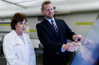 Senator Jacky Rosen (D-NV 3rd District) watches as Assistant Dean of Biomedical Science Integration Neil Haycocks, M.D., Ph.D. demonstrates a Sectra Anatomy Terminal at the UNLV School of Medicine Monday, April 15, 2019.