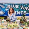 Carrie Hogan, manager of Fresh52 Farmers' & Artisan Market, poses for a photo Sunday, April 7, 2019.