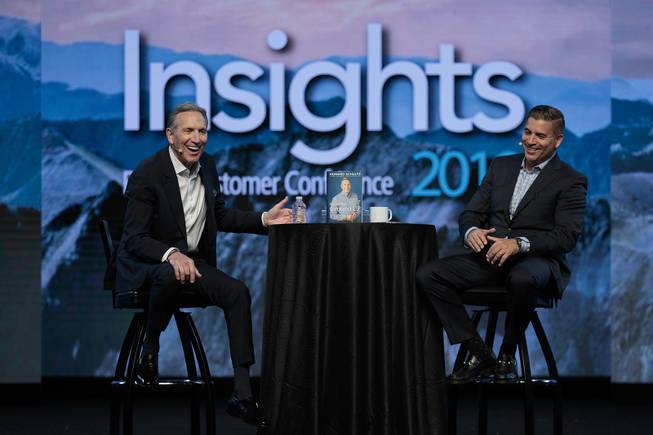 Former Starbucks CEO Howard Schultz laughs on stage with Epicor CEO Steve Murphy during the Epicor Insights conference at Mandalay Bay Wednesday, April 17, 2019.