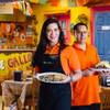 Vanessa Barreat and her husband Raul Martinez-Olmos, owners of Pico De Gallo, pose for a photo inside their restaurant Wednesday, April 17, 2019.