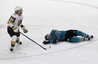 San Jose Sharks center Joe Pavelski, right, lies on the ice next to Vegas Golden Knights center Cody Eakin during the third period of Game 7 of an NHL hockey first-round playoff series in San Jose, Calif., Tuesday, April 23, 2019.