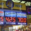 In this Aug. 22, 2017, file photo, signs display lottery prizes in Chicago.