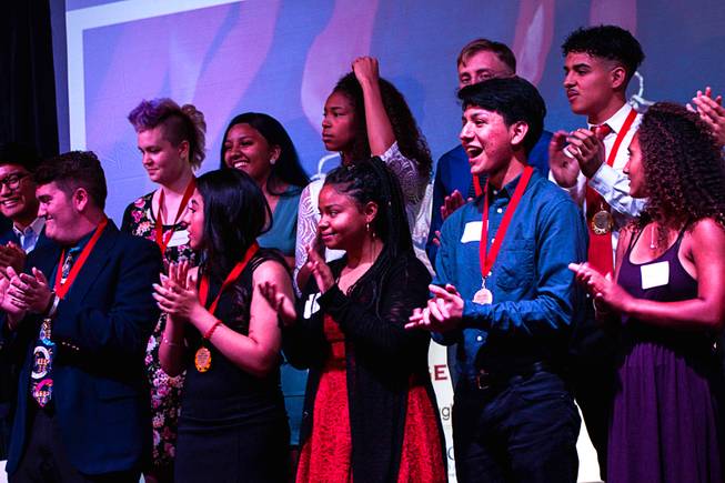 Clark County high school seniors applaud after being awarded scholarships by the Rogers Foundation at the Industrial Event Space Saturday April 27, 2019.