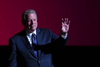 Former Vice President Al Gore waves at the conclusion of 