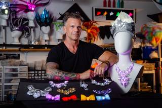 Ronnie Brust, owner and designer for Good to Glow, a light up wearables company, poses for a photo in his studio Monday, April 29, 2019.