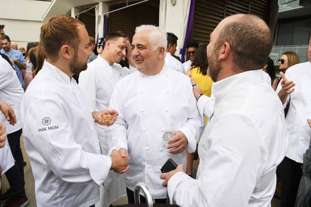 Chef Guy Savoy greets other chefs as Vegas Uncork'd kicks off its 13th year with a ceremonial 