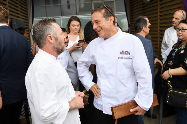 Chef Bruce Bromberg talks with another chef as Vegas Uncork'd kicks off its 13th year with a ceremonial 