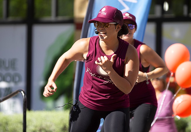 Jessica Peralta, owner of Fit4Mom Las Vegas, leads a workout ...