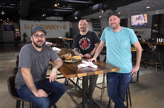 Owners Bryant Jane, left, and Lyle Cervenka, right, with consulting chef Johnny Church, center, at the Hardway 8, 46 S. Water St., in downtown Henderson, May 14, 2019.