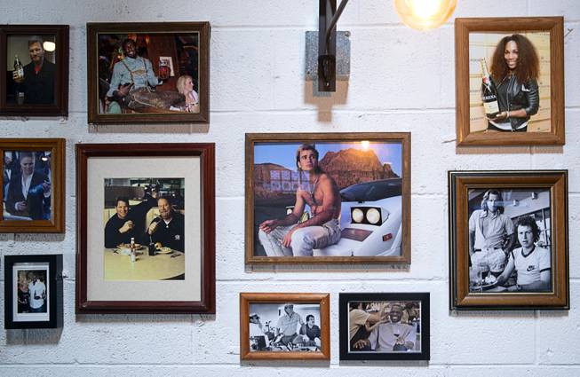 Photos decorate a wall at the Hardway 8, 46 S. Water St., in downtown Henderson, May 14, 2019.