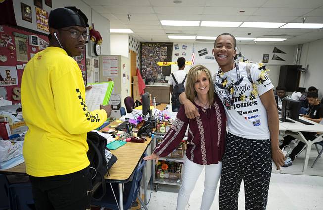 Eldorado High School teacher Shana Stott poses with students in her classroom Tuesday, May 14, 2019. Stott is an Eldorado HS graduate and has worked at the school for more than 20 years.